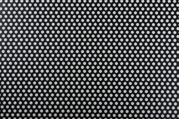 Black and white decorative pattern texture with repeating balls.