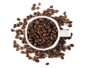 Coffee beans in porcelain cup isolated on white background, top view