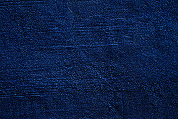 Blue colored abstract wall background with textures of different shades of blue