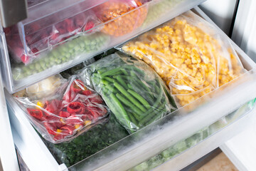 Assortment of frozen vegetables in the freezer. Frozen vegetables.