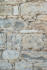 Old stone background. Ancient weathered stone wall texture.