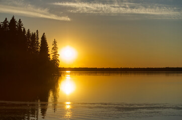 Obraz na płótnie Canvas Astotin Lake under the Glow of the Setting Sun