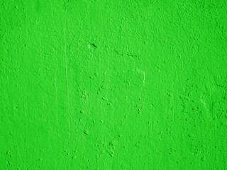 Abstract background from green plaster on the wall.