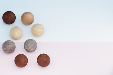 Wooden balls on a delicate background 3D render