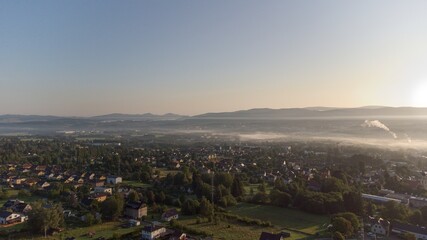 Sunrise in the foggy city. landscape and view on Liberec 
