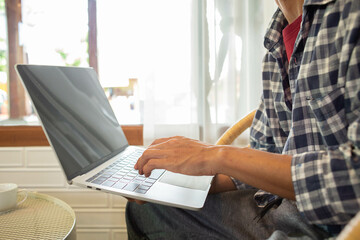 businessman working use laptop in office for discussing documents and ideas , with soft focus, vintage tone