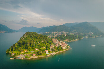 Obraz premium Aerial view of Bellagio village in the evening. Bellagio is a picturesque and traditional village, located on the southern shore in peninsula of Lake Como, Italy