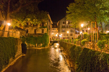 Fototapeta na wymiar Annecy in Alps, Old city canal view by night, France, Europe