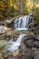 Fototapeta na wymiar waterfall in the forest in Autumn