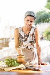 Young Woman Cooking Healthy mediterranean Food outdoor