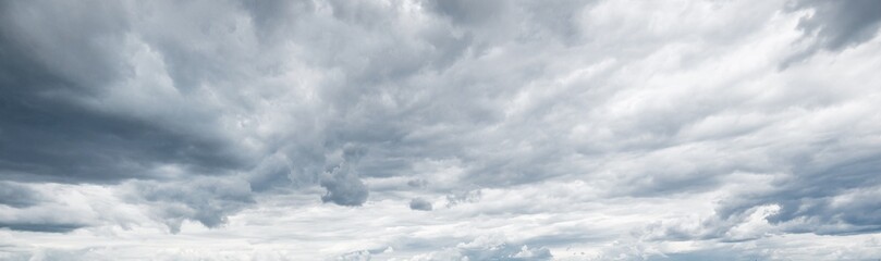 Fototapeta Ornamental clouds. Dramatic sky. Epic storm cloudscape. Soft sunlight. Panoramic image, texture, background, graphic resources, design, copy space. Meteorology, heaven, hope, peace concept obraz