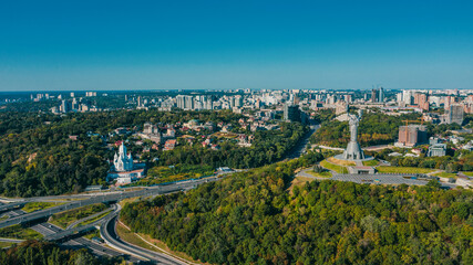 Aerial view to the  Beautiful cityscape  city Kiev  in sunny day. Top view to the urban landscape. Panorama of a big european city.