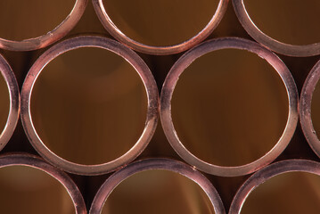 Macro front view of stack copper tubes