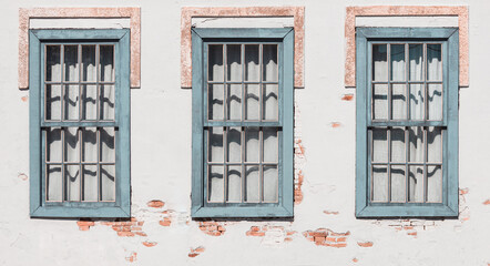 Obraz premium Background and texture of wall with windows in old house.