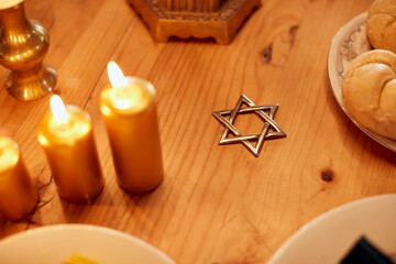 Star of David on dining table during Hanukkah meal.