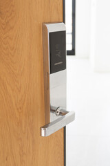Modern entrance door for apartment equipped with safe card lock system.