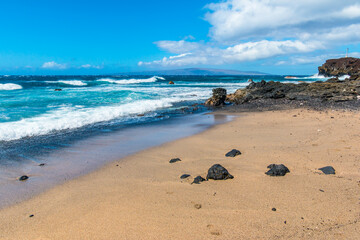 The Volcanic Shoreline of Cape Hanamanioa And Kaho'olawe Island Across The Blue Waters of La Perouse Bay, Makena-La Perouse State Park, Maui, Hawaii, USA