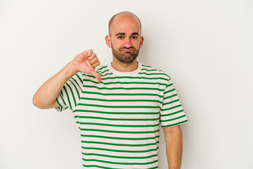 Young bald man isolated on white background showing thumb down, disappointment concept.