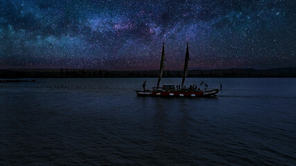 Ancient Maori Boat is Sailing Under the Starry Sky