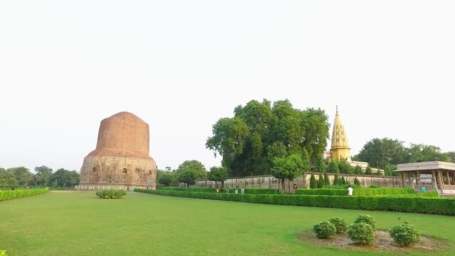 The Dhamekh Stupa with Green Lawns at the Archaeological Buddhist Site in Sarnath, Varanasi, India