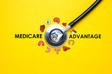 A picture of stethoscope with human organ illustration and Medicare Advantage word. Medicare...