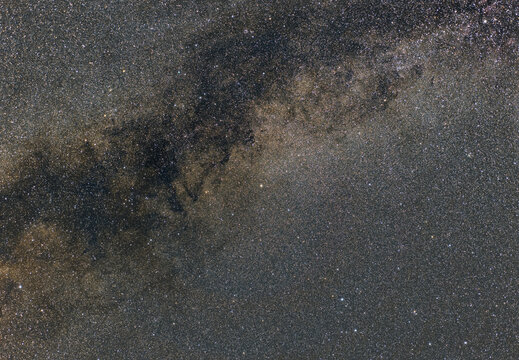 The Milky Way crossed by a black river of dust and gas photographed on a late summer night