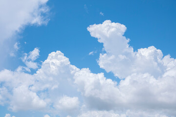 Naklejka na ściany i meble Blue sky with white clouds on sunny day. 