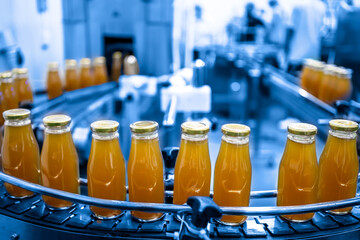 Factory interior of beverage, Production line of manufacturing and packaging juice products, Close...