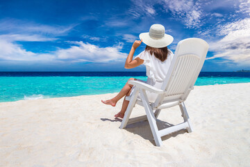 Woman lying in sunbed