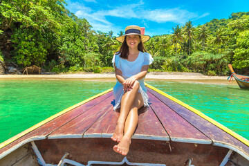 Woman on boat in Thailand