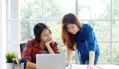  Asian women at home office, Happy two young asian women working with laptop computer at office, Asian friends working together with happiness, Asia girl working at home, online education