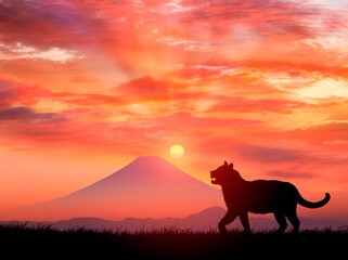 朝日と富士山にトラ