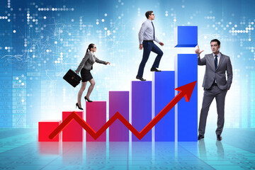 Business people supporting economic growth on chart