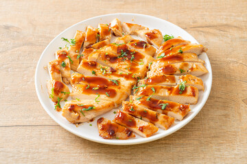 grilled chicken breast sliced on plate