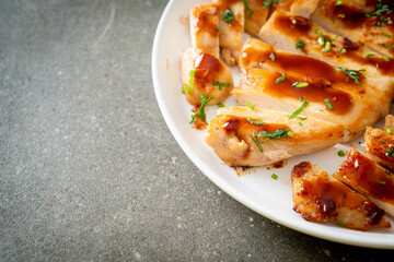grilled chicken breast sliced on plate