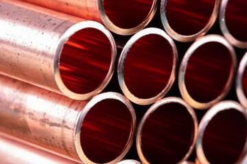 Metallurgical industry copper pipes close up - obrazy, fototapety, plakaty