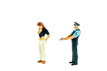 Miniature people office, worker, police and thief concept in variety action on white background...