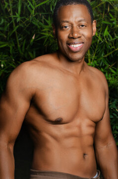 Portrait of shirtless, muscular Black man 