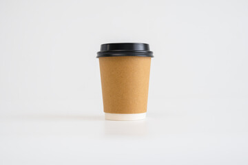 brown paper cup with black top coffee isolated on white background.