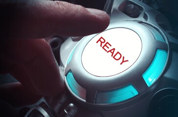 Finger about to press a car ignition button with the text "Ready" .