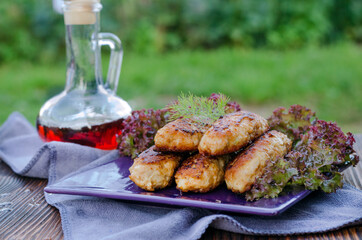 Chicken cutlets on a plate with lettuce
