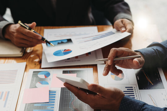 business people partners group negotiating at boardroom meeting.Multiethnic executive team discussing financial partnership agreement project strategy brainstorming sitting at table in office.