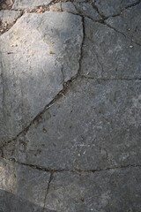 Old dirty wall close up. Grunge abstract photo background.  Beautiful stone texture pattern.
