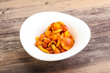 Marinated pickled honey mushrooms in the bowl