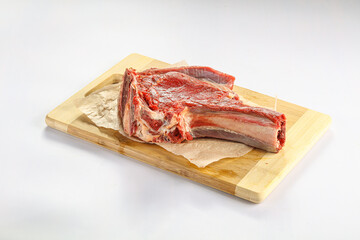 Raw bones for cooking over board