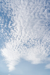 Natural background with blue sky and white clouds.