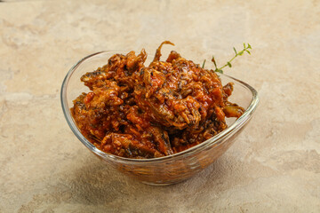 Canned anchovy in tomato sauce