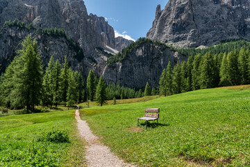 Mountain path in the Valley of Alta Badia with Group of Sella in background, Dolomites, Italian Alps