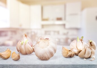 Garlic bulbs on the desk. Organic food background.