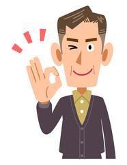 手でOKマークを作るカジュアルな服装の年配の男性
